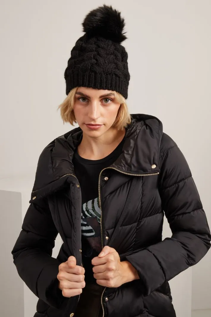 Cuffia in maglia a trecce