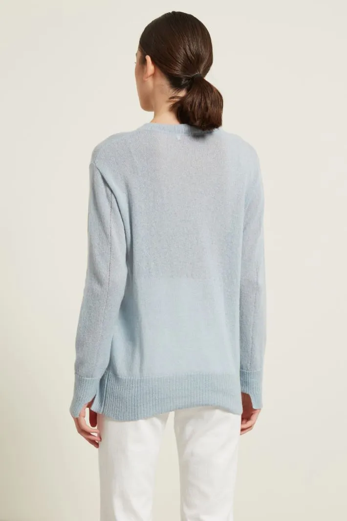 Maglia con fondo asimmetrico