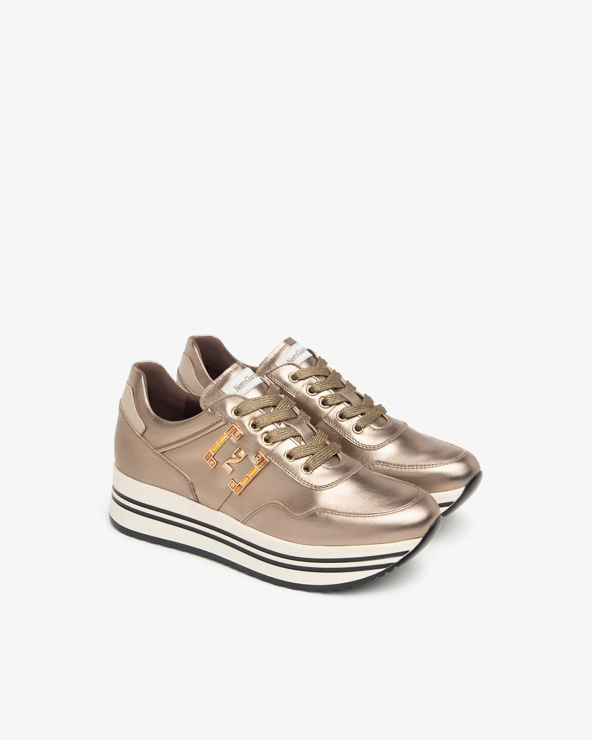 Scarpe da ginnastica dorate di Malus
